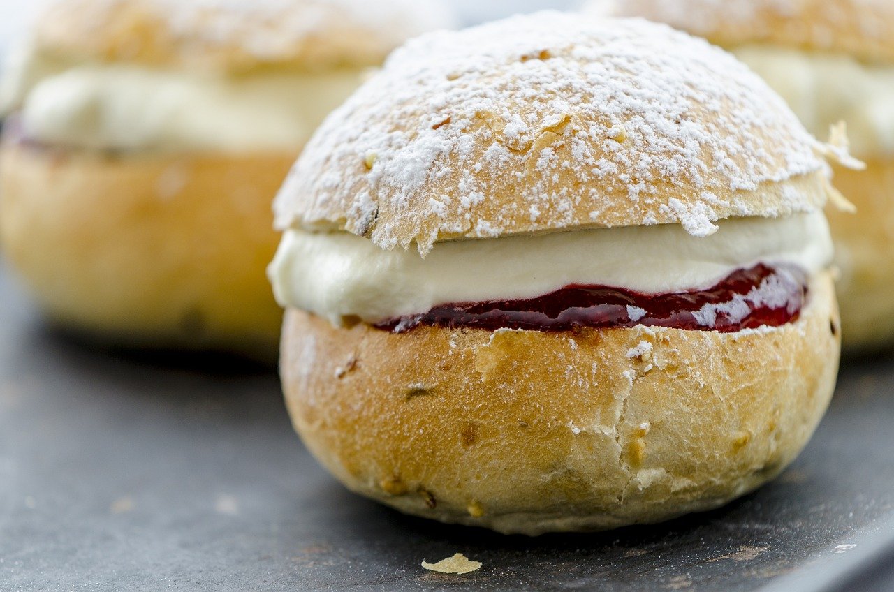 with a bun, cream bun, bun, pastry, dessert, cream, strawberry jam, shrovetide, food, candy, delicacy, tradition, cream bun, cream bun, cream bun, cream bun, cream bun